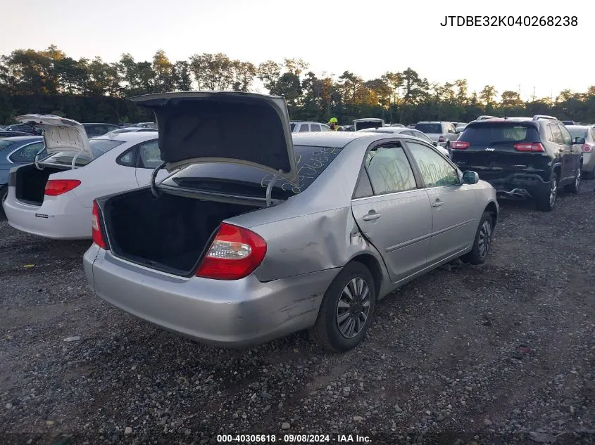 2004 Toyota Camry Le VIN: JTDBE32K040268238 Lot: 40305618