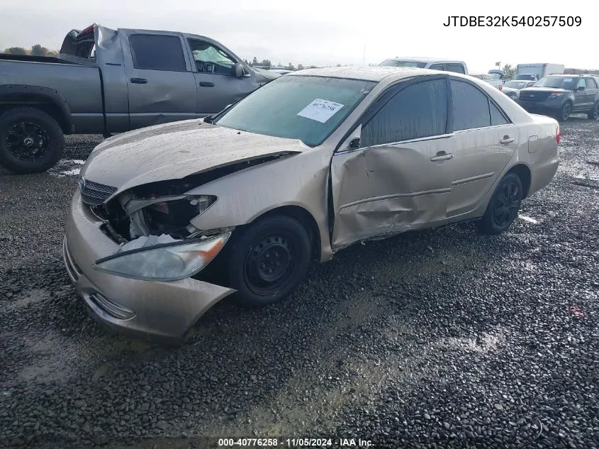 2004 Toyota Camry Le VIN: JTDBE32K540257509 Lot: 40776258