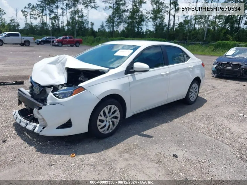 2017 Toyota Corolla Le VIN: 5YFBURHE5HP670534 Lot: 40089330