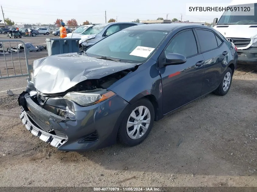 2017 Toyota Corolla L VIN: 5YFBURHE6HP691120 Lot: 40770979