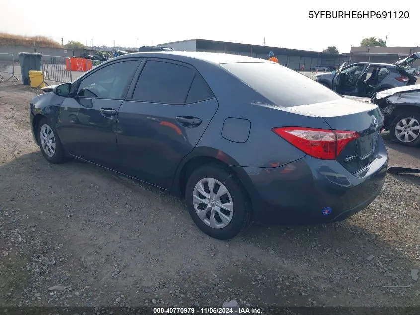 2017 Toyota Corolla L VIN: 5YFBURHE6HP691120 Lot: 40770979