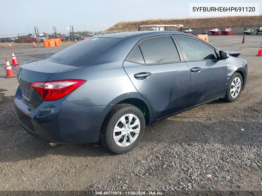 2017 Toyota Corolla L VIN: 5YFBURHE6HP691120 Lot: 40770979