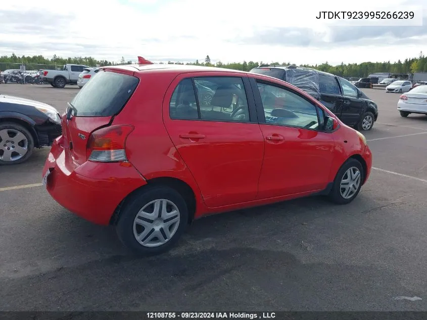 2009 Toyota Yaris VIN: JTDKT923995266239 Lot: 12108755