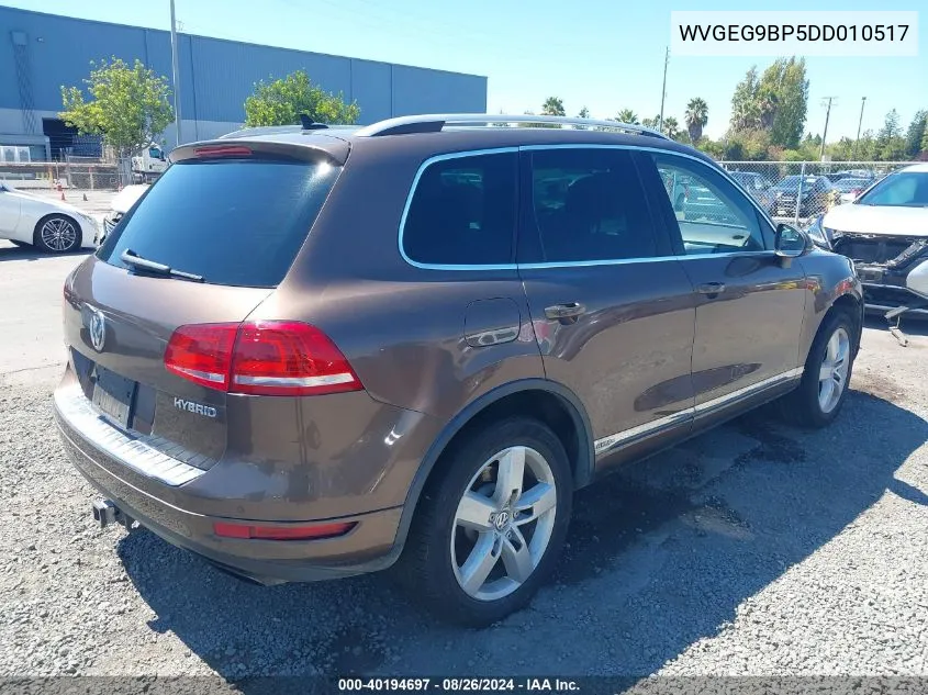 2013 Volkswagen Touareg Hybrid VIN: WVGEG9BP5DD010517 Lot: 40194697